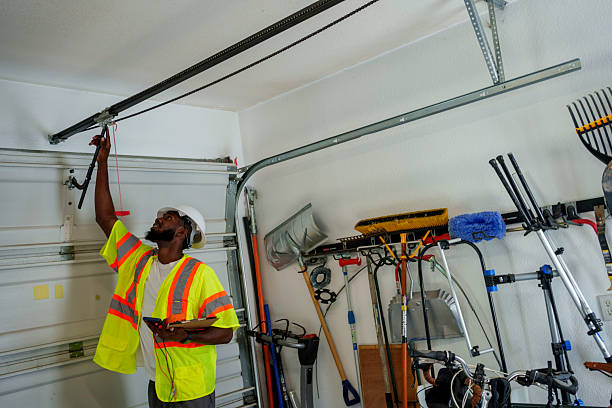 Professional Garage Door Panel Replacement technician working in Ludington, MI